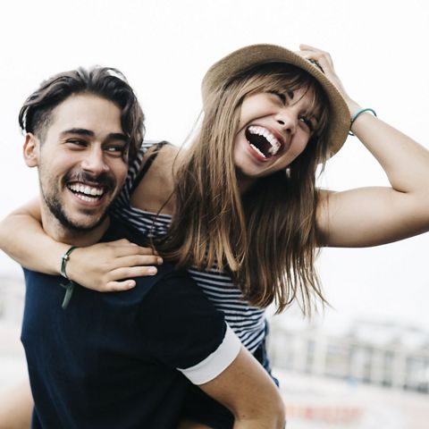 Two women smiling and taking a selfie